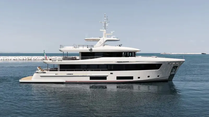 Seen from astern, the stacked aft decks that give ten guests somewhere to sit at every level.