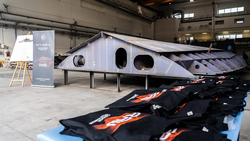 The RAW 110's keel section takes shape in Cantiere delle Marche's Ancona shed ahead of the hull's 21 October 2025 keel-laying ceremony; the hull is later named M/Y Amiga.