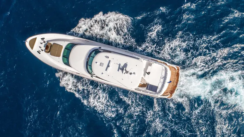 Directly astern underway, the transom door and swim platform that give tender and water-toy access at the waterline.