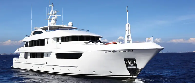 The EP150 underway, the profile built around Horizon's raised pilothouse and a full-beam owner's deck below it.