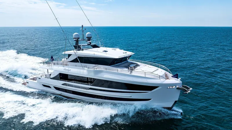 Running in shallow turquoise water, where a 1.72 metre draft reaches anchorages a deeper hull cannot.