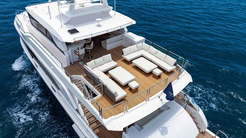 The upper deck aft lounge, shaded and open to the sea on three sides.
