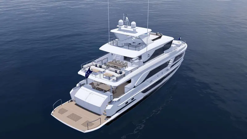 Looking down over the stern shows the teak cockpit dining table, the lowered swim platform and the tender garage doors built into the transom.