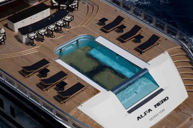 The sundeck pool, ALFA NERO GEORGETOWN lettered on the pool floor beneath the loungers.
