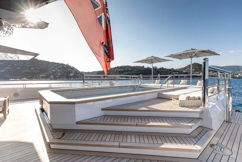 The infinity-edge plunge pool on the bridge deck, anchored off the Italian Riviera.