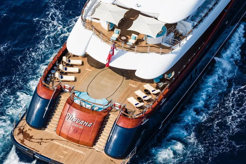 Aerial view of the transom, her name and home port of George Town lettered above twin tender garages.