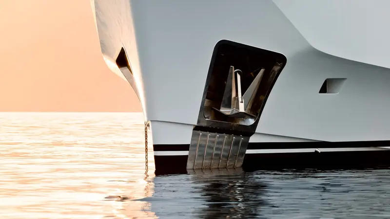 A close view of the bow thruster and anchor fairlead, finished flush into the hull rather than bolted onto it.