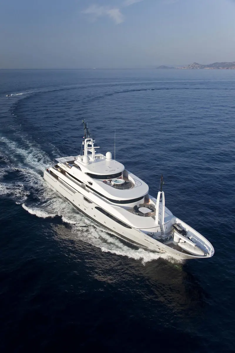 Taleya under way off the French Riviera, a full-custom Rossinavi build finished in the yard's characteristic pale grey hull.