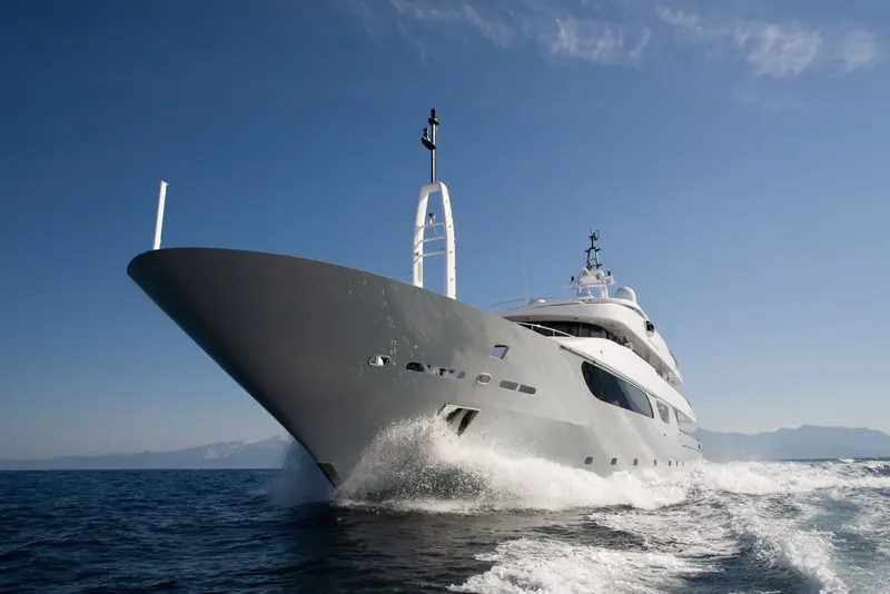Bow-on and throwing spray at speed, the hull's flat run aft is built for efficient cruising rather than outright top speed.