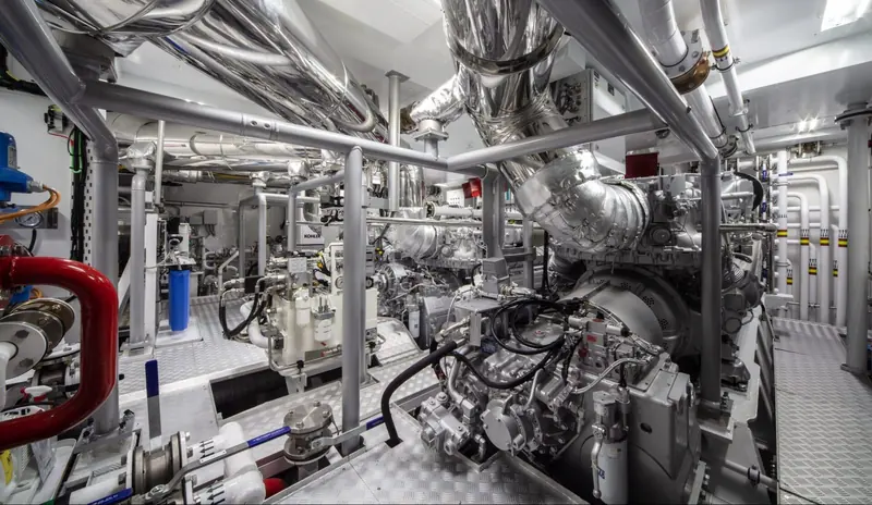 Inside the GranSport 45's engine room: the twin diesel installation, pipework and manual valve banks a surveyor would check on a used boat.