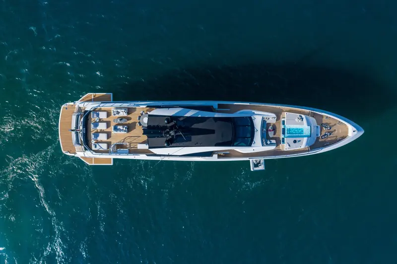 An aerial view of the GranSport 45 underway, showing the full sundeck and cockpit layout from above.