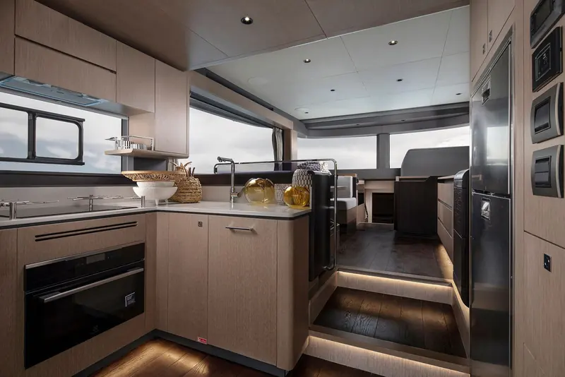 The galley in full-size format, laid out in a run rather than a U so two people can work it at once.