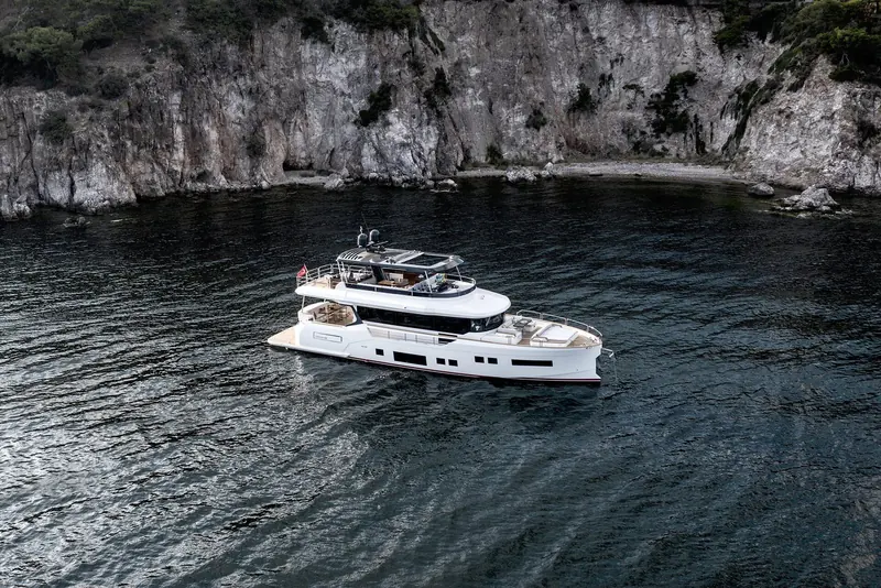 Tucked into a narrow limestone cove, dwarfed by the cliff walls on both sides - the shallow-draft cruising the 68 is built for.