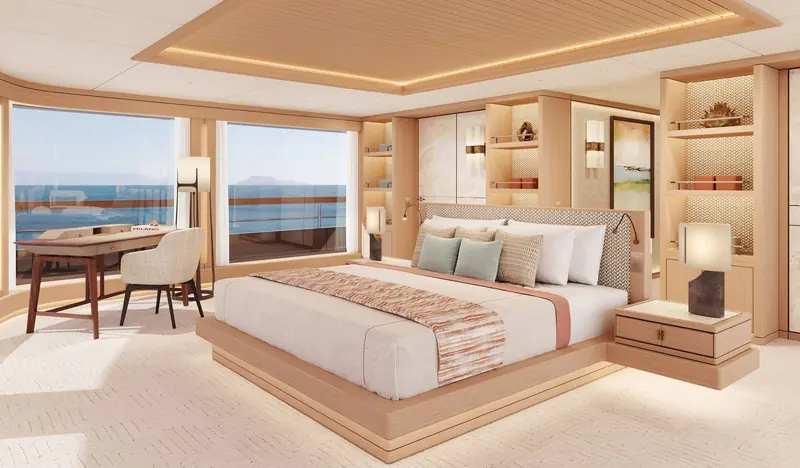 One of the guest cabins, with a private desk nook and shelving built into the window bay.