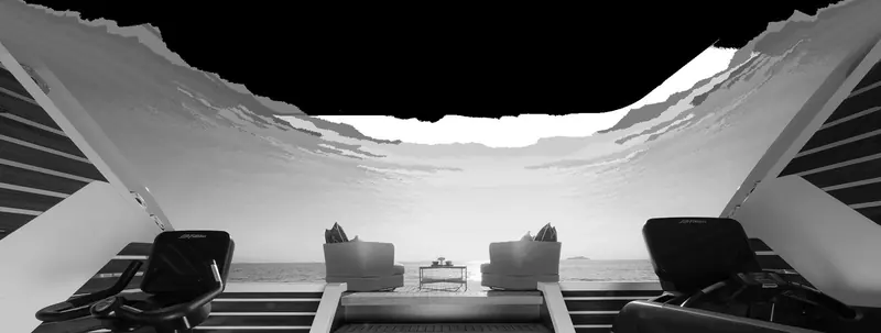 The panoramic gym on Angelique's bridge deck, looking out over open water.