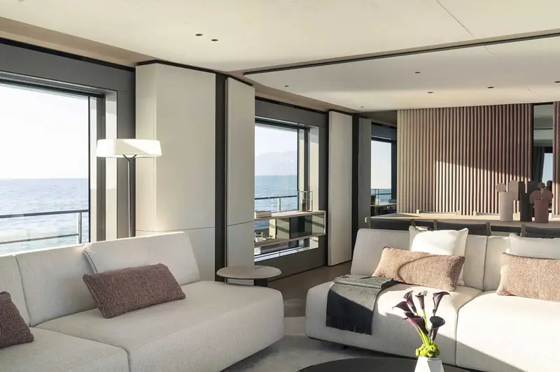 The main saloon of an Azimut Grande 36M, its low-slung seating and floor-to-ceiling glazing part of Achille Salvagni's interior for the line.