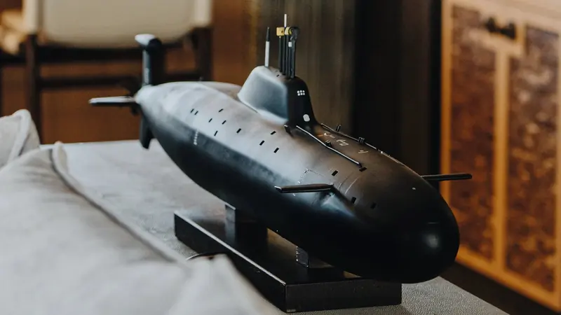 A model submarine sits as a decorative piece inside Akula, part of her interior detailing.