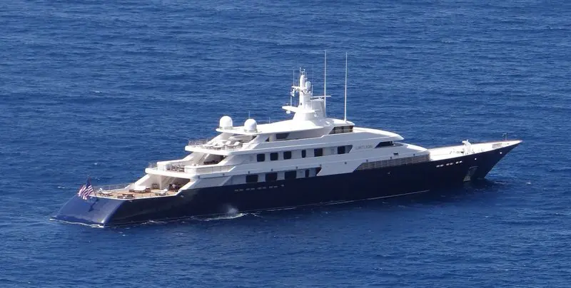 Underway near Capri, Limitless shows the long dark blue hull under her white superstructure.