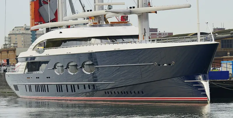 Black Pearl's bow at the Oceanco yard on delivery day, the naval architecture already proven before the DynaRig ever caught its first breeze of wind.
