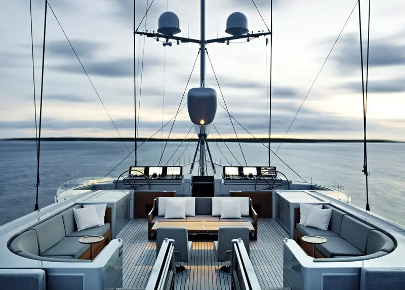 The aft cockpit of Vertigo, looking forward past the twin helm stations to the mast and the sea beyond - the loft-like, low-clutter deck language Liaigre calls Urban at Sea.