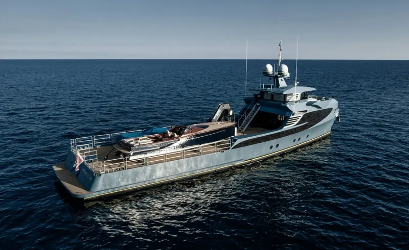 Phi Phantom, the 36 metre Alia Yachts shadow vessel styled to match her mothership Phi, carries the tenders, toys and extra fuel so Phi herself needs almost none of the usual deck clutter.