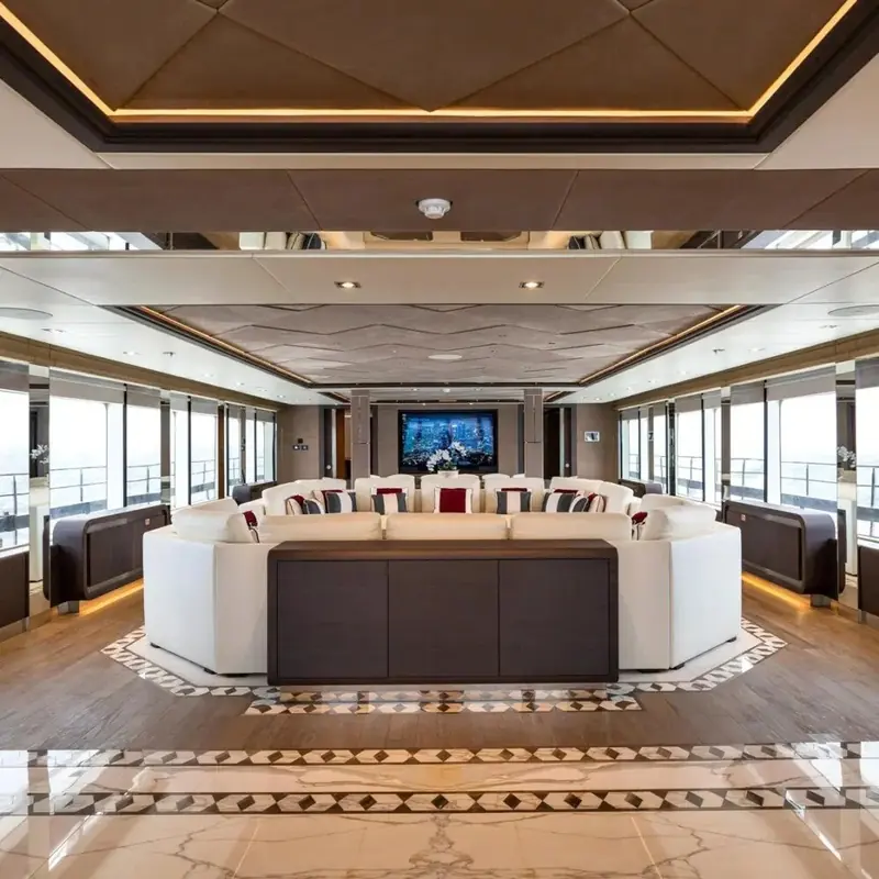 A circular cinema lounge on the Majesty 175, the kind of dedicated single-use room Gatto's studio builds into a flagship once the hull is large enough to spare the space for it.