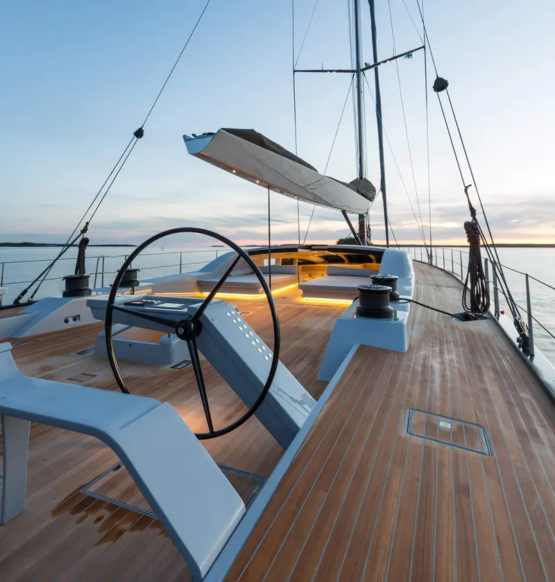 The helm of WinWin, Design Unlimited's 33-metre Baltic sloop delivered in 2014 and the studio's 2015 ShowBoats Design Award winner, a smaller sailing brief from the same studio.