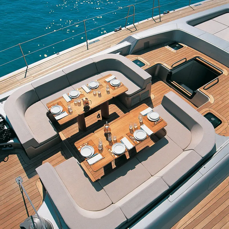 Dark Shadow's aft cockpit table, laid for lunch under the boom, one of the few sailing yacht commissions in Foster and Partners' marine portfolio.