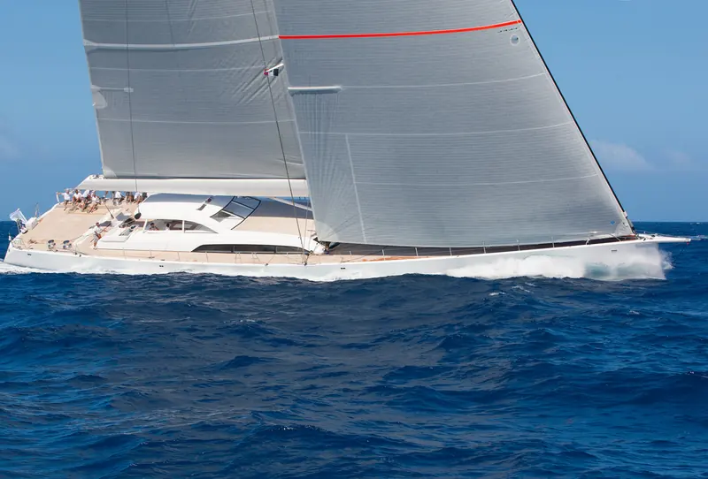 Unfurled reaching hard on the water she was built for. The low-drag hull and telescopic keel were drawn by Frers to trim for real offshore performance, not just rating-rule speed.