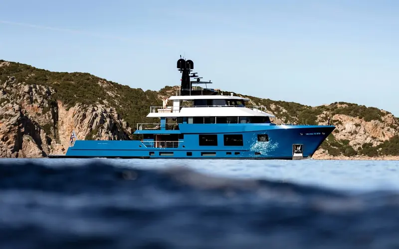 King Benji, Marshall's 46.7m expedition yacht for Miami entrepreneur Josh Golder, delivered by Dunya Yachts in 2024 in the acid-blue livery Golder chose over a conventional white hull.