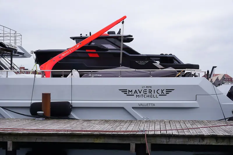 The transom carries her full name, Lt. Pete Maverick Mitchell, and home port Valletta, above a drop-down bulwark and bathing platform.