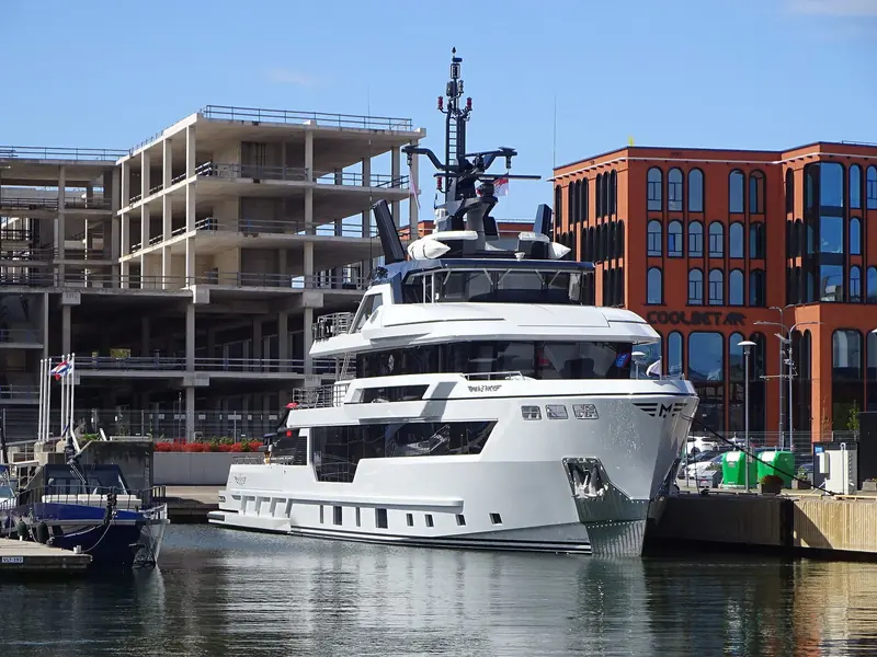 Maverick in Tallinn's Old City Marina. The vertical bow and utility styling read as an explorer first and a superyacht second, Hydro Tec's usual trade.