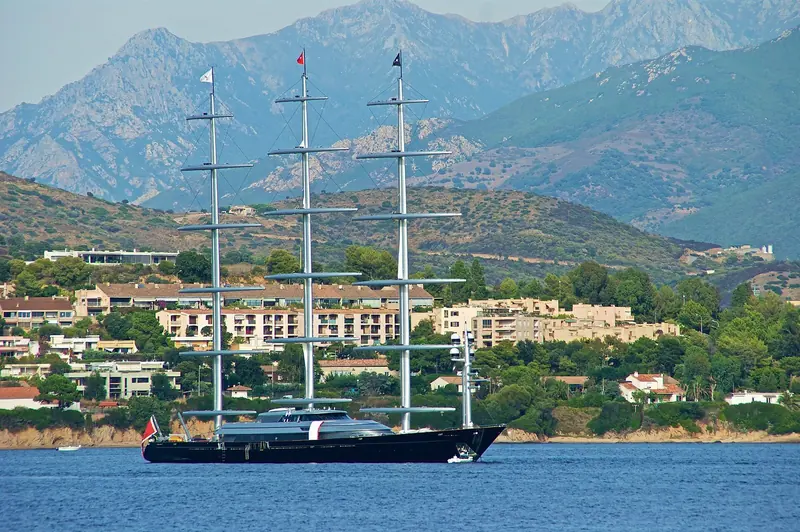 Maltese Falcon under sail off Corsica, her three freestanding DynaRig masts carrying square sails without a single stay or shroud.