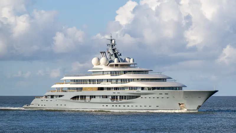 Flying Fox, the 136 metre Lurssen carrying Mark Berryman's interior, underway with her name visible on the hull.