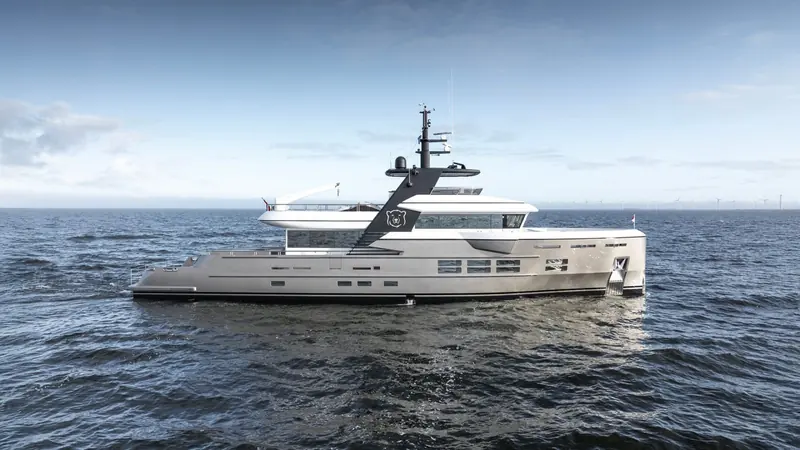 MY Ursus at sea after relaunch, her tall enclosed mast and exploration-vessel profile the clearest sign of how far the 2025 rebuild carried her past her original 1990s-era hull.
