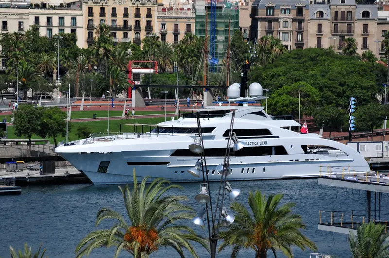 Galactica Star, the 65 metre Heesen delivered in 2013, moored in Port Vell, Barcelona. Her exterior was built around Van Oossanen's new Fast Displacement Hull Form.