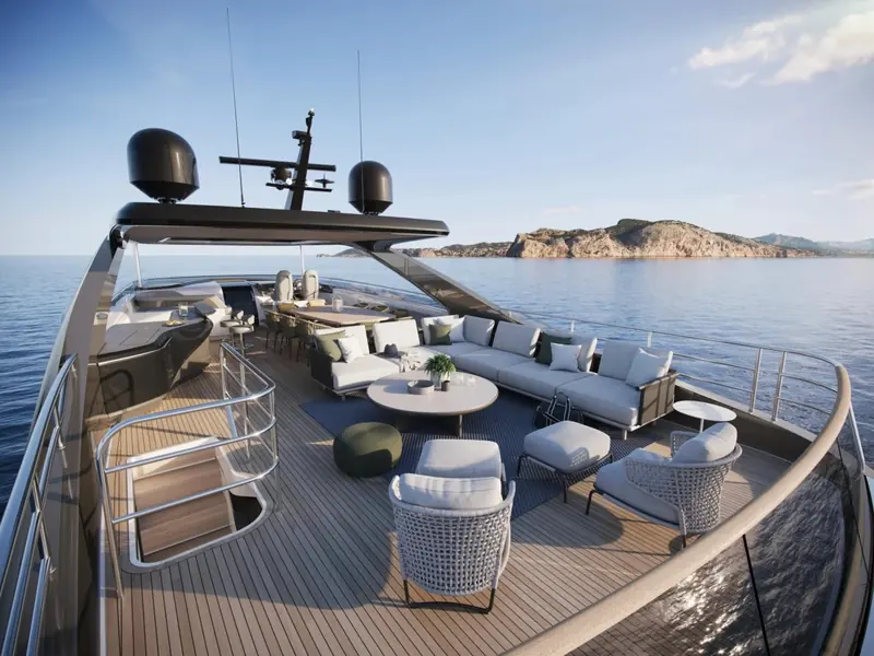 The Y95's flybridge dining and lounge area, radar arch and helm seating visible forward, part of the exterior Pininfarina Nautical worked on with Princess's own design studio.