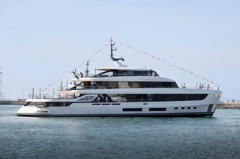 The Grande 44M under way for the first time, still dressed with signal flags, the hull form P.L.A.N.A. Design worked out alongside Azimut's own R&D department now proving itself in open water.