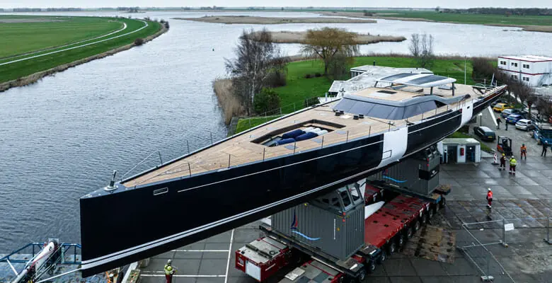 Aerial view of Nilaya's rollout from Royal Huisman's build hall onto the transporter, ahead of launch and 2023 delivery.