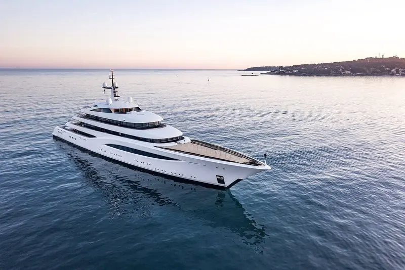 Faith sits on a glassy sea off Antibes in the first light of the morning.