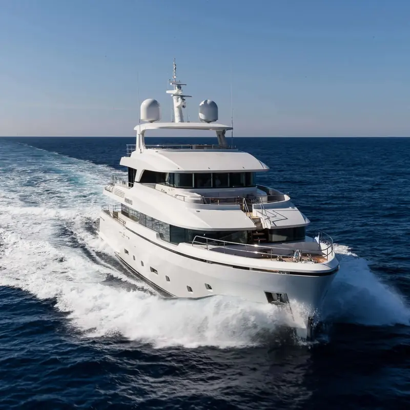Brigadoon running, her name visible on the bow; naval architecture came from Diana Yacht Design and exterior styling from Rene van der Velden, with Studio Indigo appointed for the interior alone.