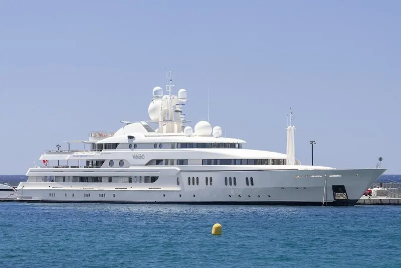 Montkaj rests against a stone quay with her name picked out on the superstructure.