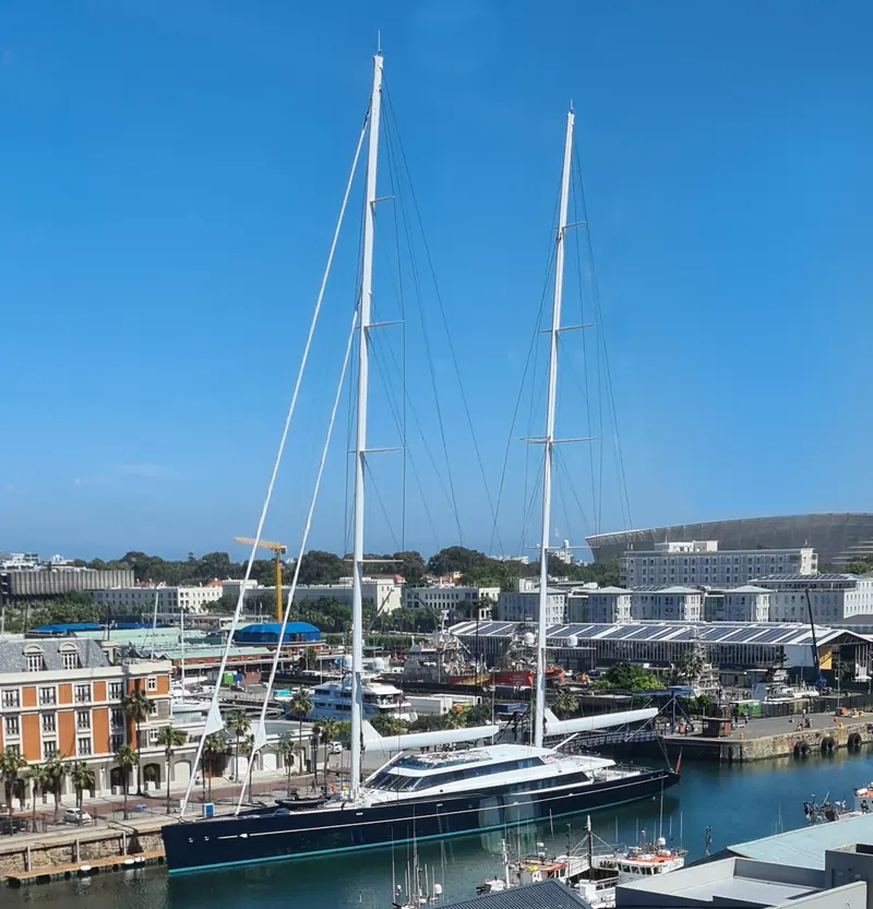 Aquijo, the 86m Tripp Design ketch built by Vitters and Oceanco and delivered in 2016, alongside at Cape Town's V&A Waterfront in October 2025 with both masts stepped and sails furled.