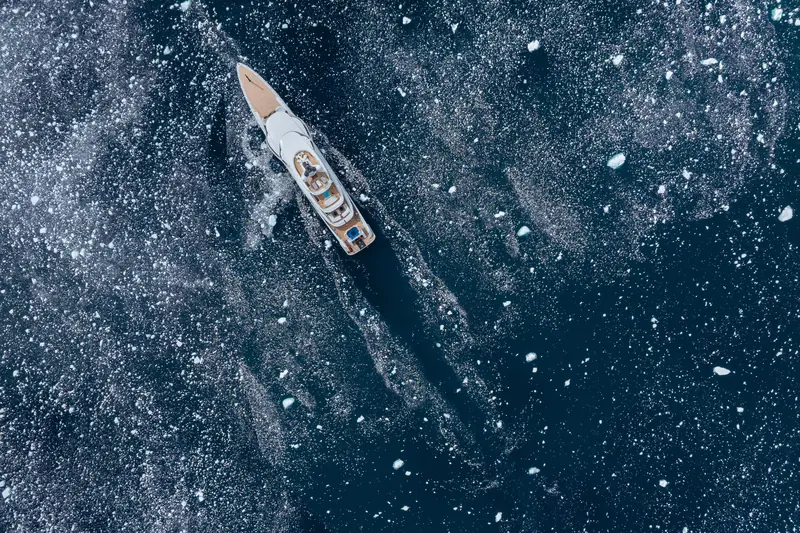 Infinite Jest, the 75 metre Turquoise Yachts explorer with a Vallicelli exterior, cutting through brash ice on her December 2023 passage to Antarctica.