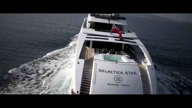 The stern of Galactica Star, Heesen's 65 metre delivered in 2013 as the first yacht built on Van Oossanen's Fast Displacement Hull Form, her home port of George Town lettered below the name; she sails today as Illusion.