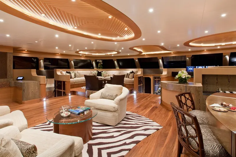 Hemisphere's main salon, interior by Michael Leach Design set inside VPLP's naval architecture and exterior; the yacht won a 2012 ShowBoats Design Award for the interior layout.