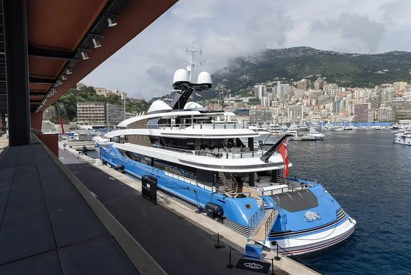Madame Gu lies against the quay in Port Hercule at Monaco, seen from a terrace above.