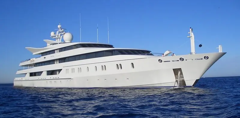 Seen from water level, Indian Empress makes way across a calm sea.