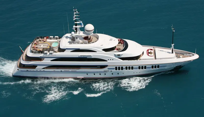 Ambrosia underway, Benetti's first diesel-electric superyacht and the project that opened Zuretti's long run of Benetti commissions.