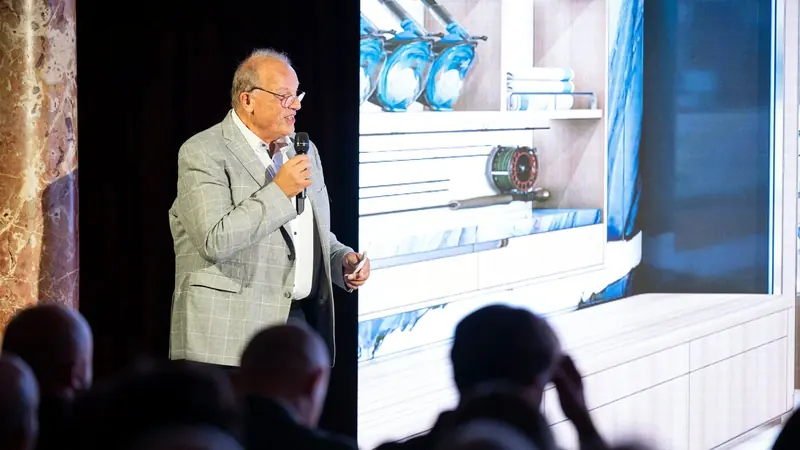 Francois Zuretti presenting his interior work to an industry audience.